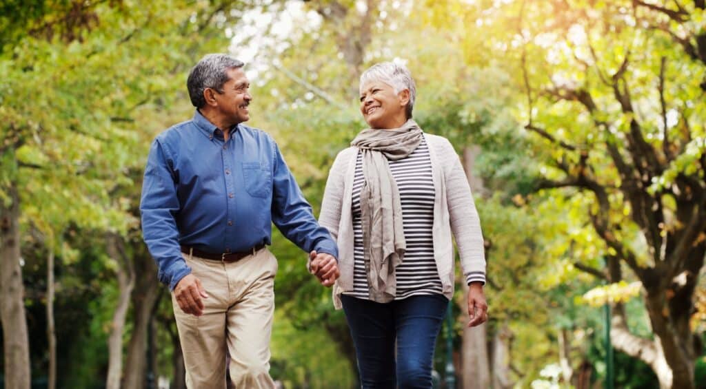 A happy middle older couple visiting the Olbrich Botanical Gardens